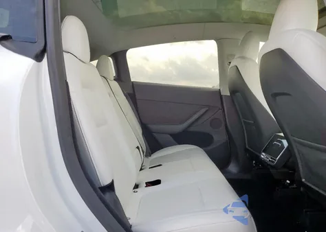 2024 Tesla Model Y из США, поврежденный, VIN 7SAYGDEEXRA257515